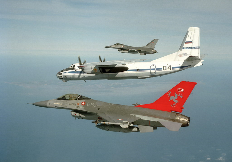 Two Danish Air Force F-16AMs escort a Russian An-30 on an Open Skies mission. OSCE Photo